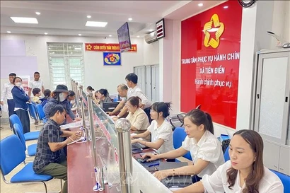 En el Centro de Servicios Administrativos Públicos de la comuna de Tien Dien, provincia de Ha Tinh (Foto: VNA)