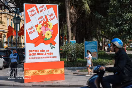 Un cartel para celebrar el día de las elecciones (Foto: VNA)